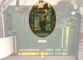 Figure 2: Close-up of the Opal Kelly XEM3050 in the new machine.